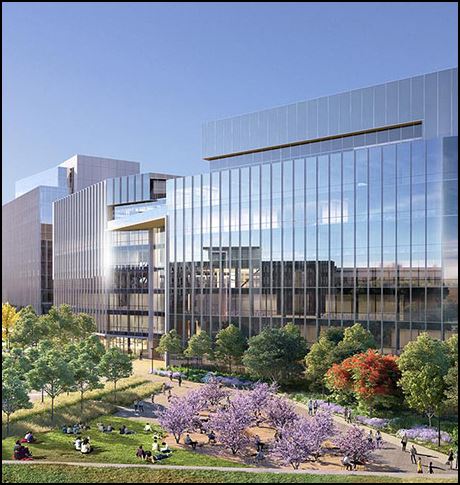 Ein Foto einer Glastüre im Meetingbereich im Amgen Büro in Wien, im Hintergrund sieht man verschwommen ein laufendes Meeting von Amgen Österreich Mitarbeiterinnen